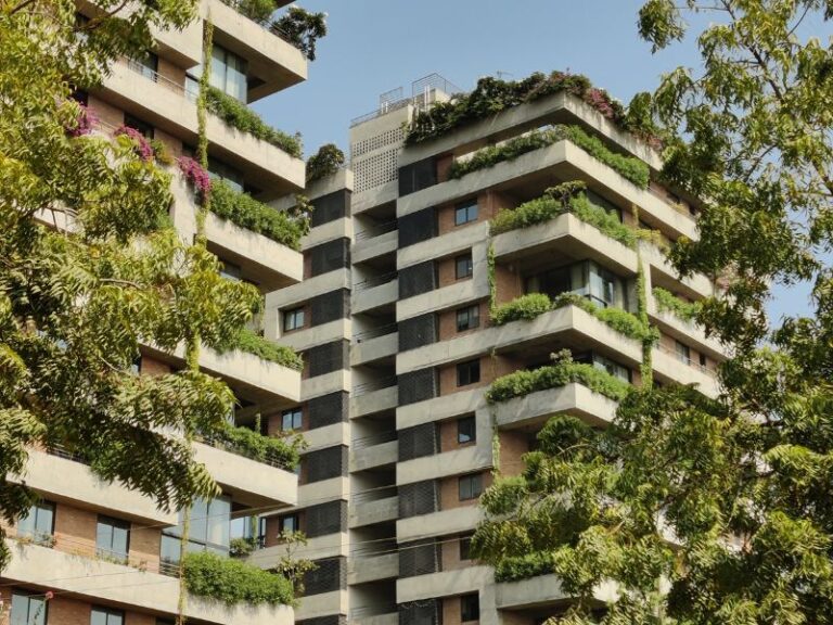 7 Benefits of Green Walls: A Sustainable Solution - Textured Apartment Building Green Wall System